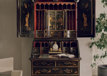 A rare George I dark green and gilt japanned bureau-cabinet